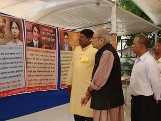 Mr. Bedekar and HJS' Mr. Sunil Ghanvat (first from left) seeing the exhibition