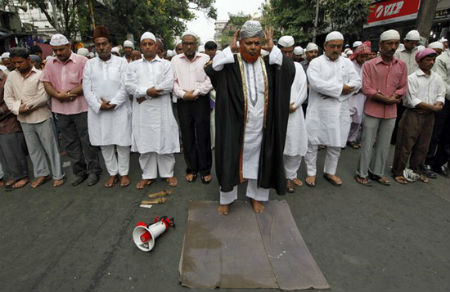 Islamists offer funeral prayers for Osama bin Laden outside a mosque in Kolkata