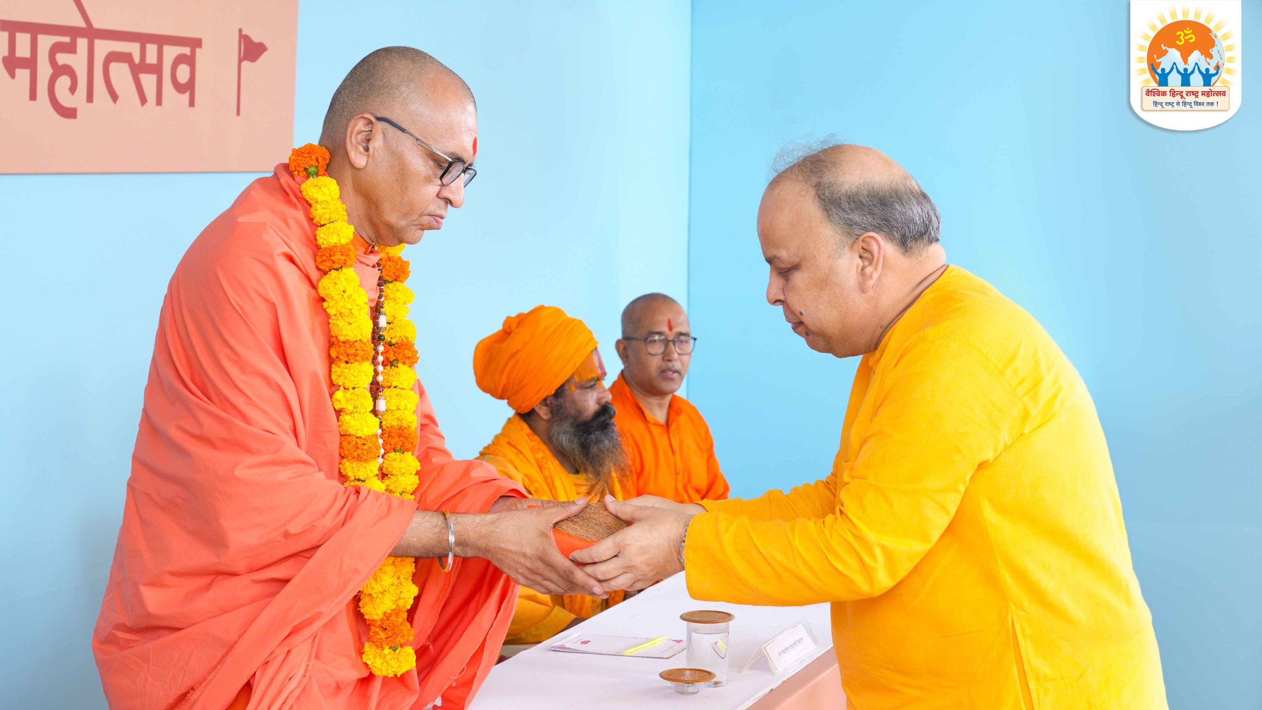 H.H. Mahamandaleshwar Acharya Narmadashankarpuri Maharaj (Niranjani Akhada, Jaipur, Rajasthan.) being felicitated by H.H. Pradeep Khemka (Dharmapracharak Saint, Sanatan Sanstha, Jharkhand.)