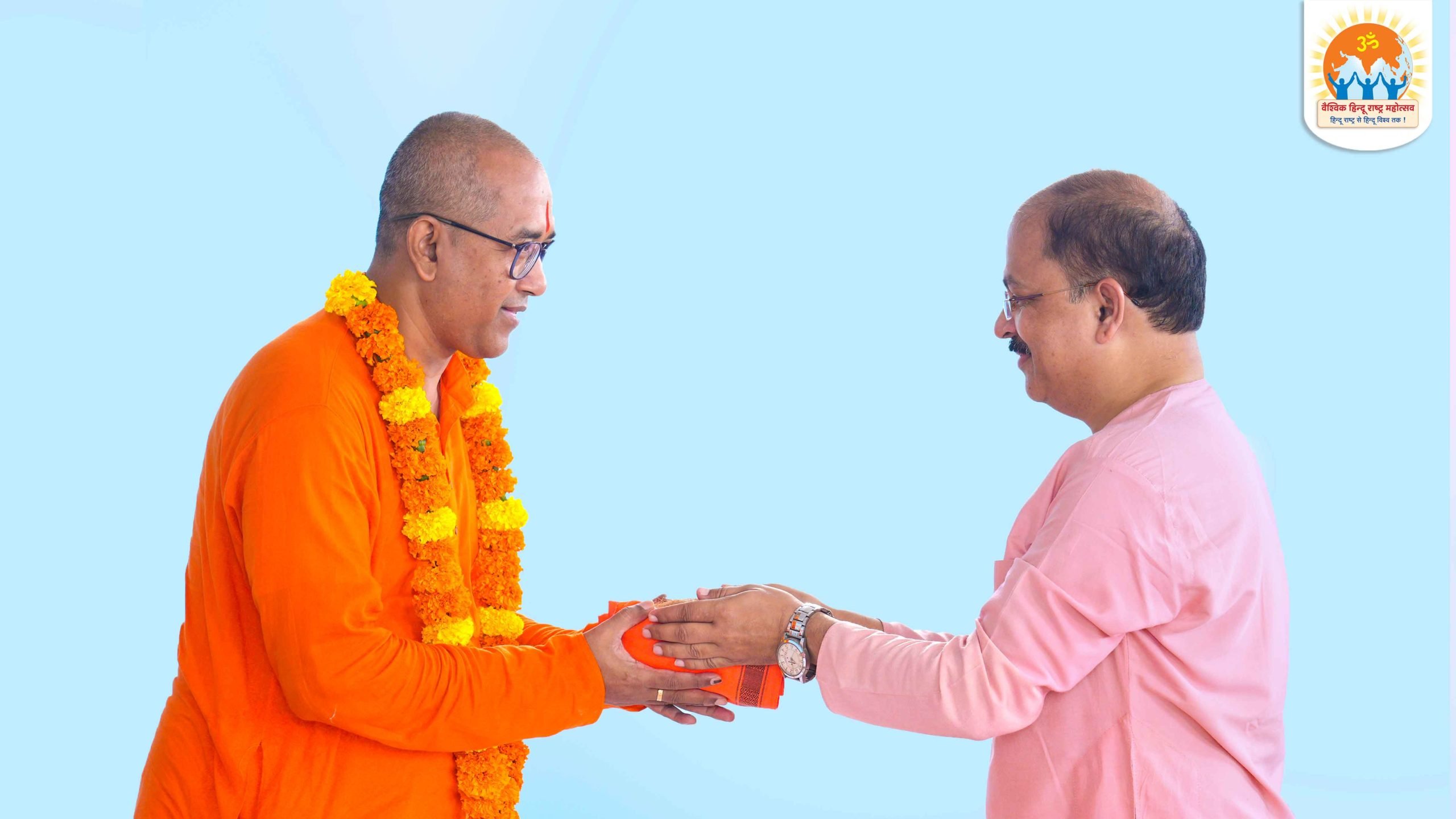 Swami Nirgunananda Puri (Treasurer & Branch Secretary For Kolkata, International Vedanta Society, Kolkata, Bengal.) being felicitated by Mr Shambhu Gaware (State Coordinator, Hindu Janajagruti Samiti, East and North-East India.)