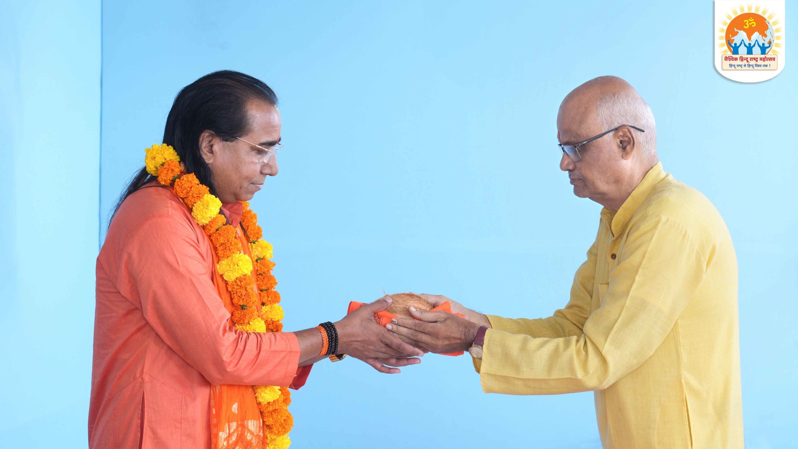 Mr Acharya Rajeshwar (National President, Sanyukta Bharatiya Dharma Sansad, Rajasthan.) being felicitated by Mr Shriram Kane (Coodinator, Hindu Janajagruti Samiti, Madhya Pradesh.)