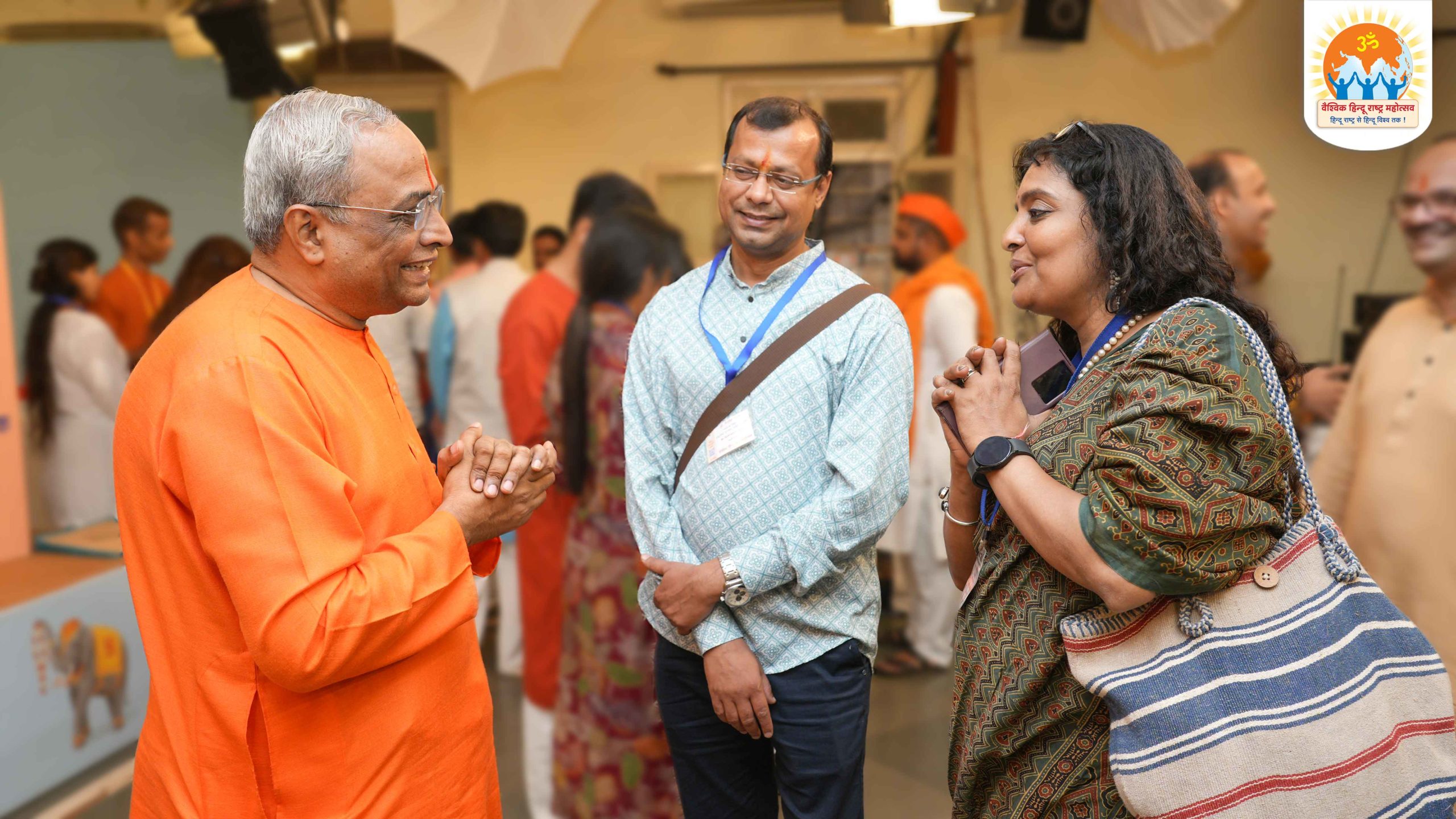 Mr Nidheesh Goyal (Founder Director, Jamboo Talks [YouTube Channel]) and Adv. (Mrs) Siddha Vidya (High Court, Jabalpur, Madhya Pradesh) speaking admiringly with Sadguru (Dr) Charudatta Pingale (National Guide, Hindu Janajagruti Samiti)
